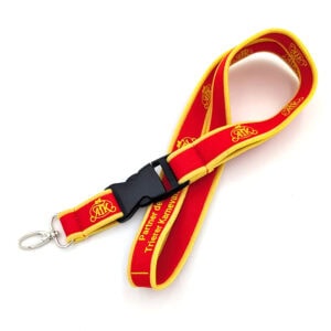 Rotes und gelbes Lanyard mit Karnevalslogo.